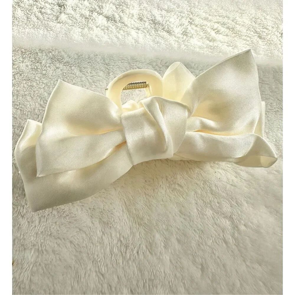 Off satin bow hair claw